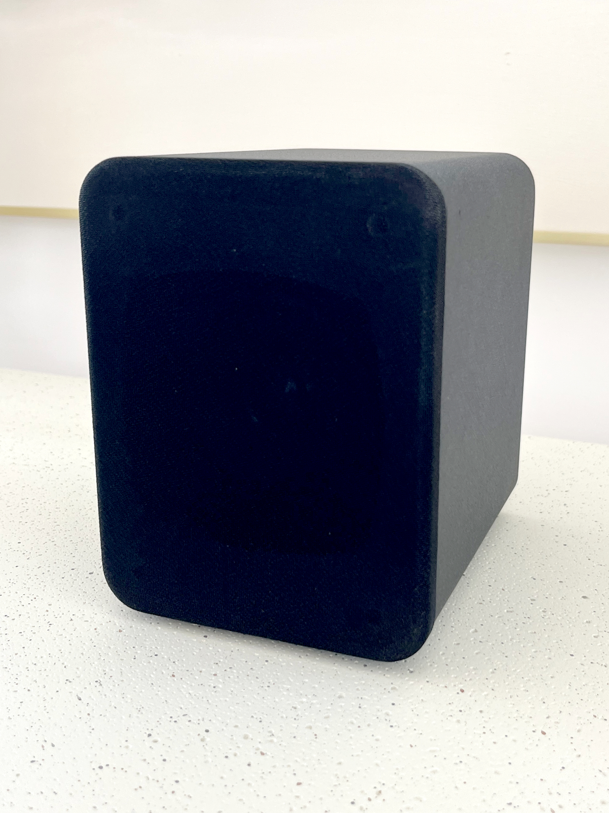 HouseWaves-One front view — matte black mesh grille